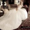 Salon photo at Ainsworth House wedding venue. Long train, strapless wedding gown.